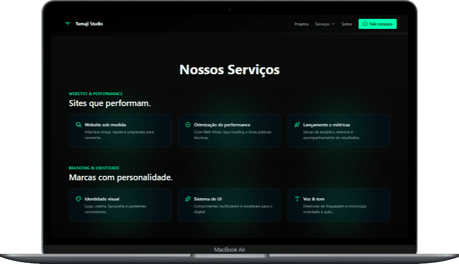 Seção Nossos Serviços do Yamaji Studio em mockup MacBook